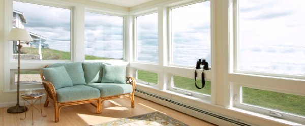 Sunroom windows overlooking a lake